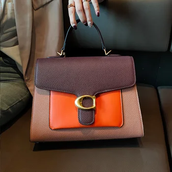 Leather women's bag 2020 winter new fashion hand-held high-end women's bag.
Leather women's bag 2020 winter new fashion hand-held high-end women's bag.