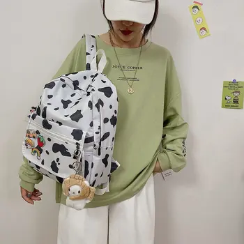 Student schoolbag female 2020 new leisure simple backpack large capacity simple cow printed Canvas Backpack
Student schoolbag female 2020 new leisure simple backpack large capacity simple cow printed Canvas Backpack