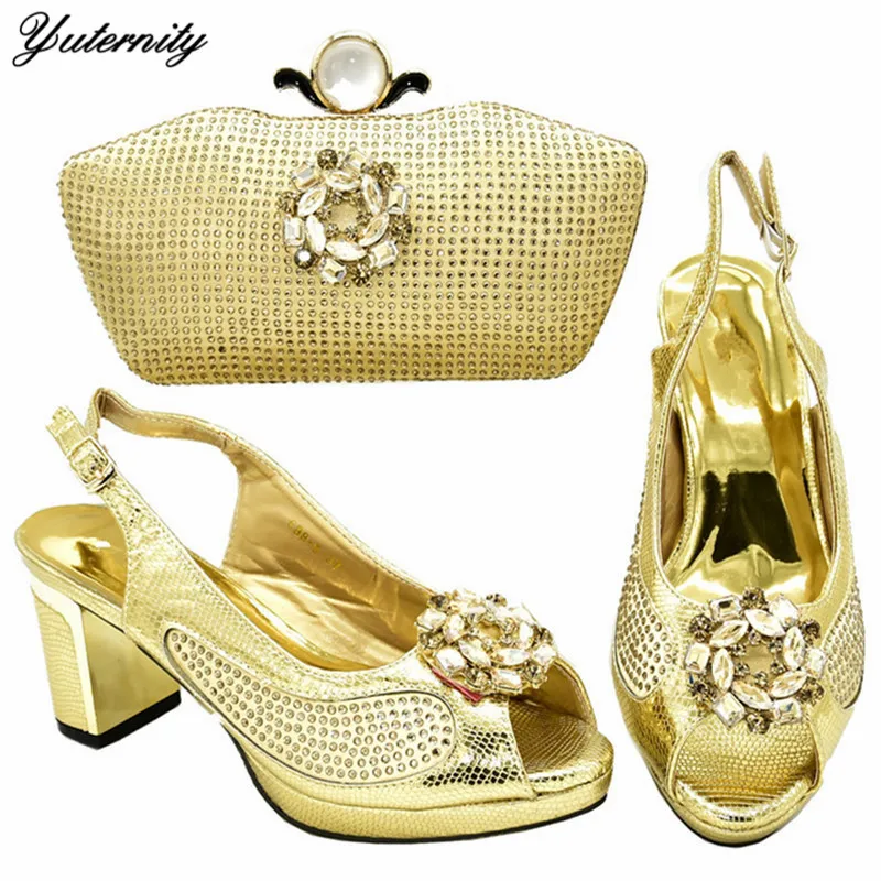 Yuternity Gold Color Beautiful Woman Shoes And Matching Bags Set Italian High Heels Shoes And Bag Set For Wedding Party On Stock
Yuternity Gold Color Beautiful Woman Shoes And Matching Bags Set Italian High Heels Shoes And Bag Set For Wedding Party On Stock