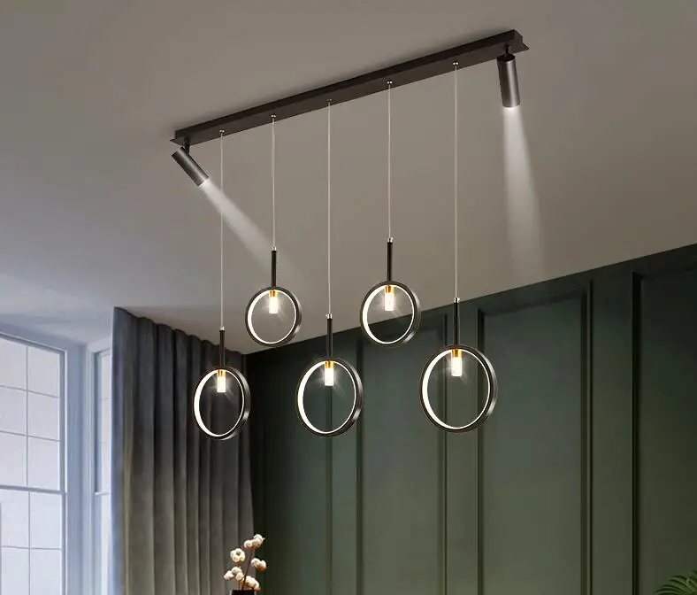 Led dining room chandelier modern simple single three head dining table bar creative personality spotlight living room lamp
Led dining room chandelier modern simple single three head dining table bar creative personality spotlight living room lamp