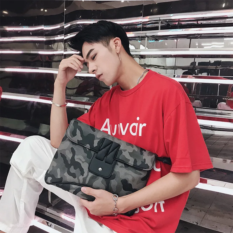 New clutch leather shoulder bag Korean leisure camouflage tide wrist bag
New clutch leather shoulder bag Korean leisure camouflage tide wrist bag