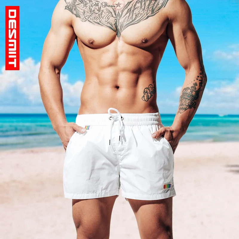 2020 New Swimwear Tethering Swimsuit Beach Pants Quick Drying Men's Shorts Sport For Bathing Loose With Pocket Swimming Trunks
2020 New Swimwear Tethering Swimsuit Beach Pants Quick Drying Men's Shorts Sport For Bathing Loose With Pocket Swimming Trunks