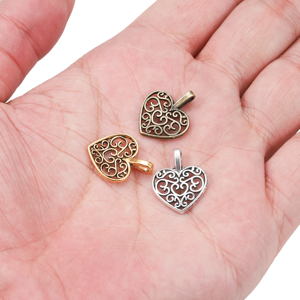 30pcs/lot Tibetan Bronze Plated Hollow Out Heart Antique Pendants Findings DIY Charms Bracelet Jewelry Making Supplies 30pcs/lot Tibetan Bronze Plated Hollow Out Heart Antique Pendants Findings DIY Charms Bracelet Jewelry Making Supplies