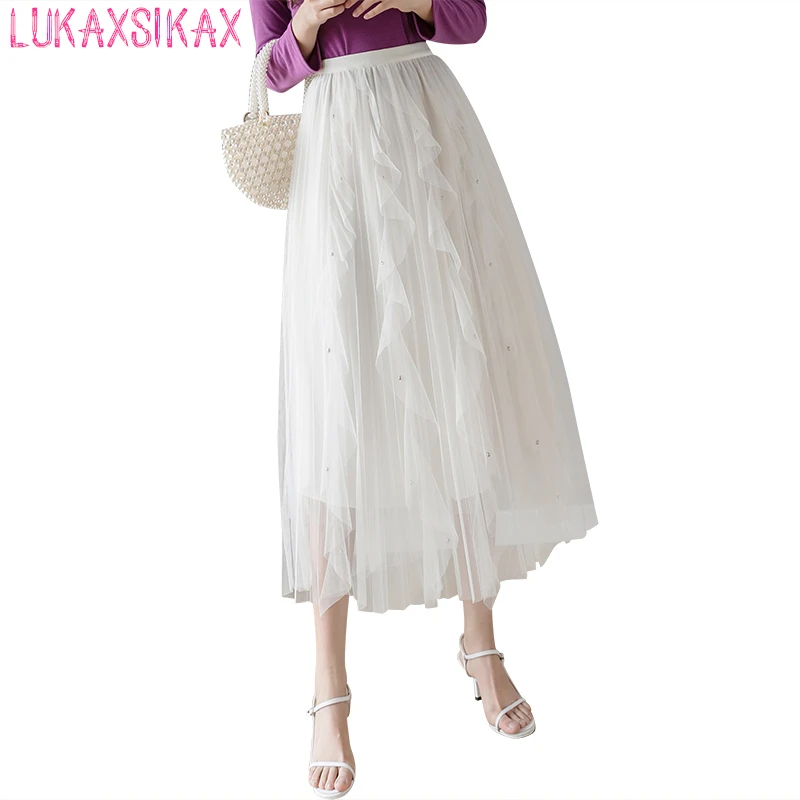 2020 New Spring Summer Women Skirt High Quality Ruffles Beading Mesh Tulle Skirt Elegant High Waist Pleated Hem Long Skirt
2020 New Spring Summer Women Skirt High Quality Ruffles Beading Mesh Tulle Skirt Elegant High Waist Pleated Hem Long Skirt