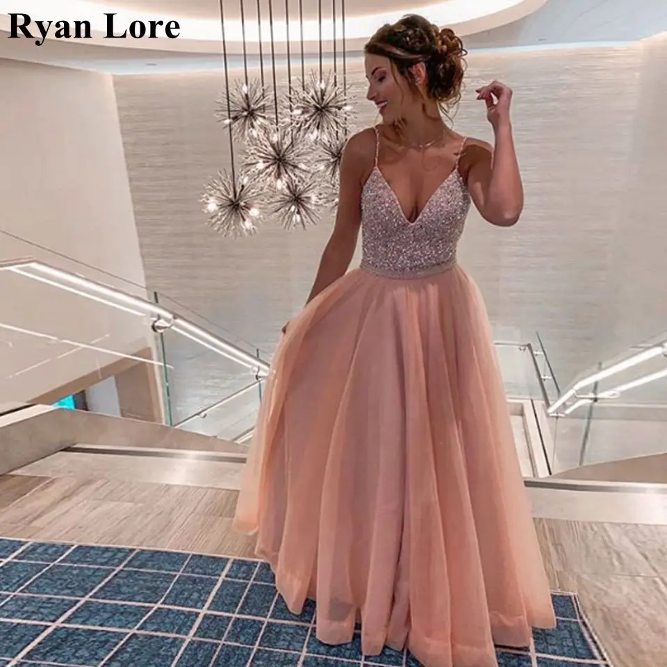 Pink Formal Prom Dresses 2020 A-Line Sequins Party Long Evening Gowns Elegant Spaghetti Straps V-Neck Vestidos Robe De Soiree
Pink Formal Prom Dresses 2020 A-Line Sequins Party Long Evening Gowns Elegant Spaghetti Straps V-Neck Vestidos Robe De Soiree