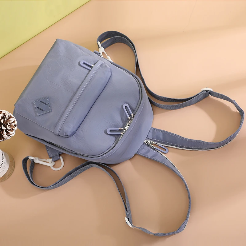 Simple girls' backpack, portable school bag, female bag, high quality nylon backpack, fashion bag, single shoulder bag
Simple girls' backpack, portable school bag, female bag, high quality nylon backpack, fashion bag, single shoulder bag