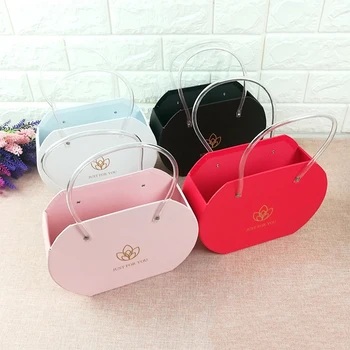 Top Opening Bag Style Paper Gift Box with Transparent Plastic Handles Holding Flowers & Gifts Just For You Happy Valentine's Day
Top Opening Bag Style Paper Gift Box with Transparent Plastic Handles Holding Flowers & Gifts Just For You Happy Valentine's Day