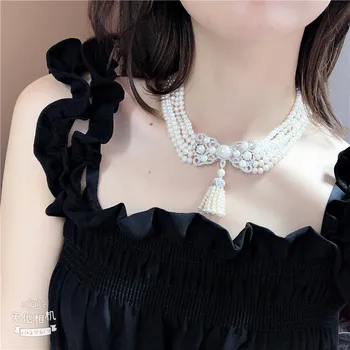 Hand knotted 5strands 7-8mm white freshwater cultured pearl micro inlay zircon accessories tassel pendant sweater necklace long
Hand knotted 5strands 7-8mm white freshwater cultured pearl micro inlay zircon accessories tassel pendant sweater necklace long