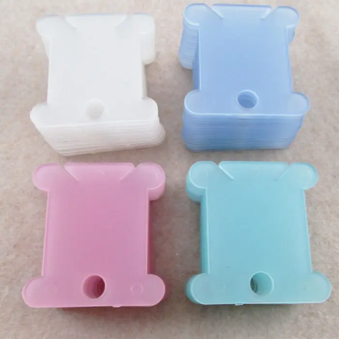 20 color mixes, plastic spools for embroidering dental floss craft storage rack boards
20 color mixes, plastic spools for embroidering dental floss craft storage rack boards