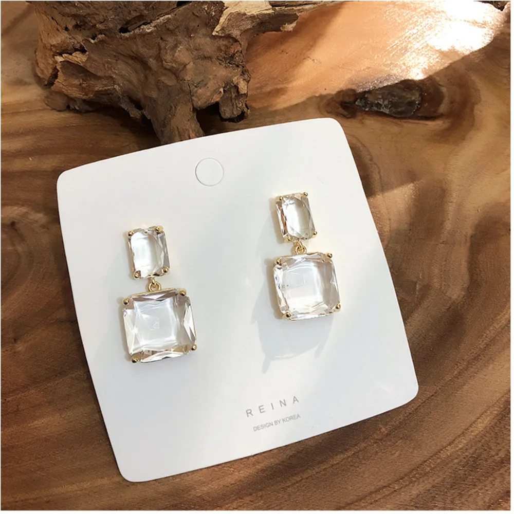 Women Trendy Geometric Crystal Glass Square Drop Earrings ZA Style Transparent Stone Earrings With Golden Edges Brincos
Women Trendy Geometric Crystal Glass Square Drop Earrings ZA Style Transparent Stone Earrings With Golden Edges Brincos