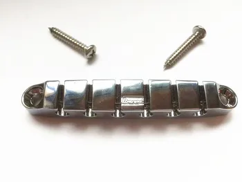 ibN guitar parts silver miniature bridge
ibN guitar parts silver miniature bridge