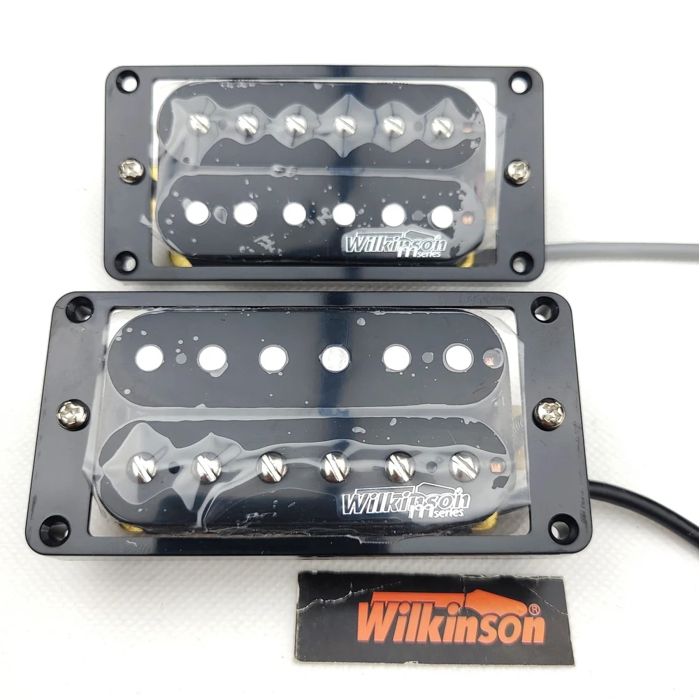 Черный электрогитара с двойной катушкой и хамбакером Wilkinson (пара мостов и шеи)
Черный электрогитара с двойной катушкой и хамбакером Wilkinson (пара мостов и шеи)