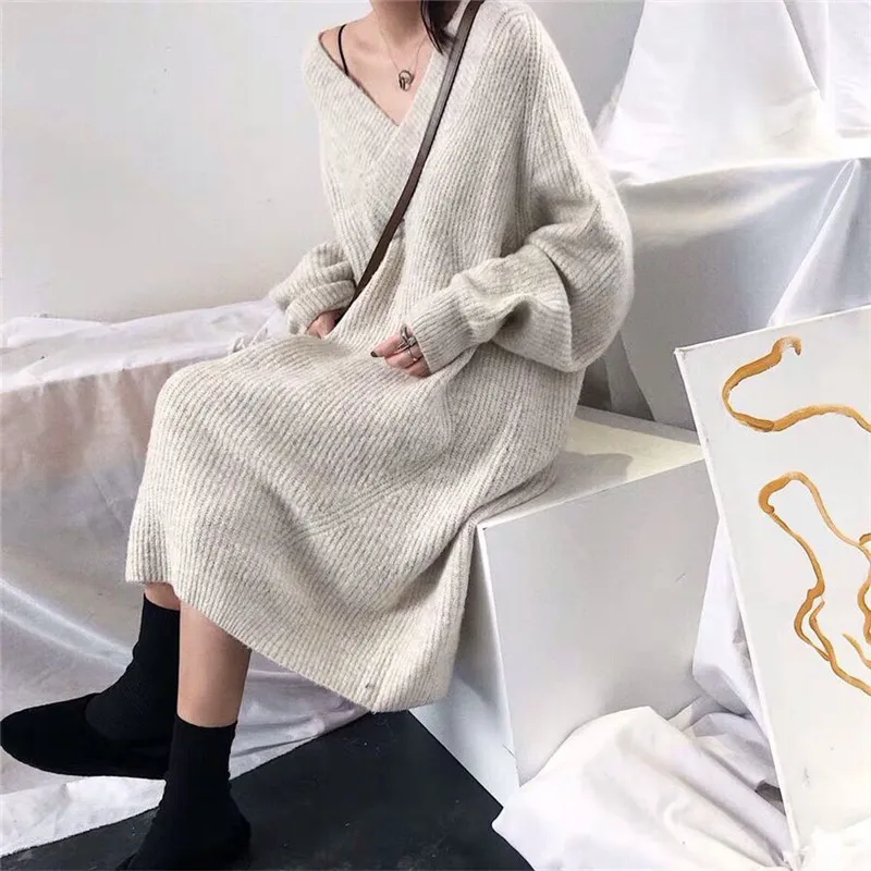 2019 autumn and winter new ins loose solid color was thin V-neck alpaca long paragraph over the knee knit sweater skirt women
2019 autumn and winter new ins loose solid color was thin V-neck alpaca long paragraph over the knee knit sweater skirt women