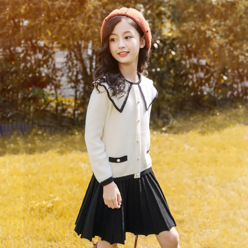 Girls' 2009 Autumn Suit Children's Mink Sweater Knitting Two-piece Suit Peter Pan Collar Sweater Skirt Two Piece Suit
Girls' 2009 Autumn Suit Children's Mink Sweater Knitting Two-piece Suit Peter Pan Collar Sweater Skirt Two Piece Suit