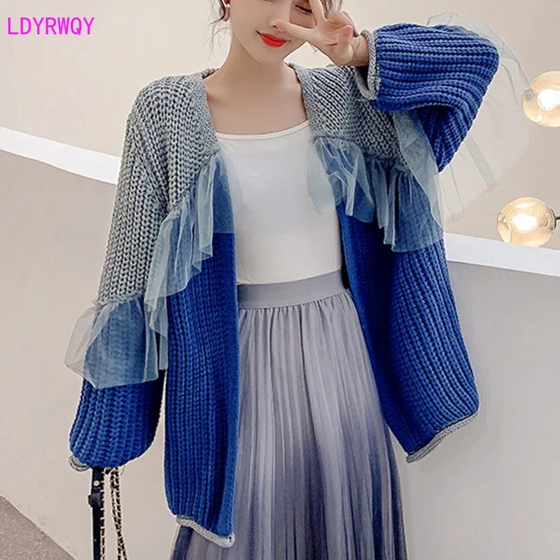 2019 autumn and winter new Korean women's net red sweet stitching ruffled edge color long sleeve loose casual knit cardigan
2019 autumn and winter new Korean women's net red sweet stitching ruffled edge color long sleeve loose casual knit cardigan