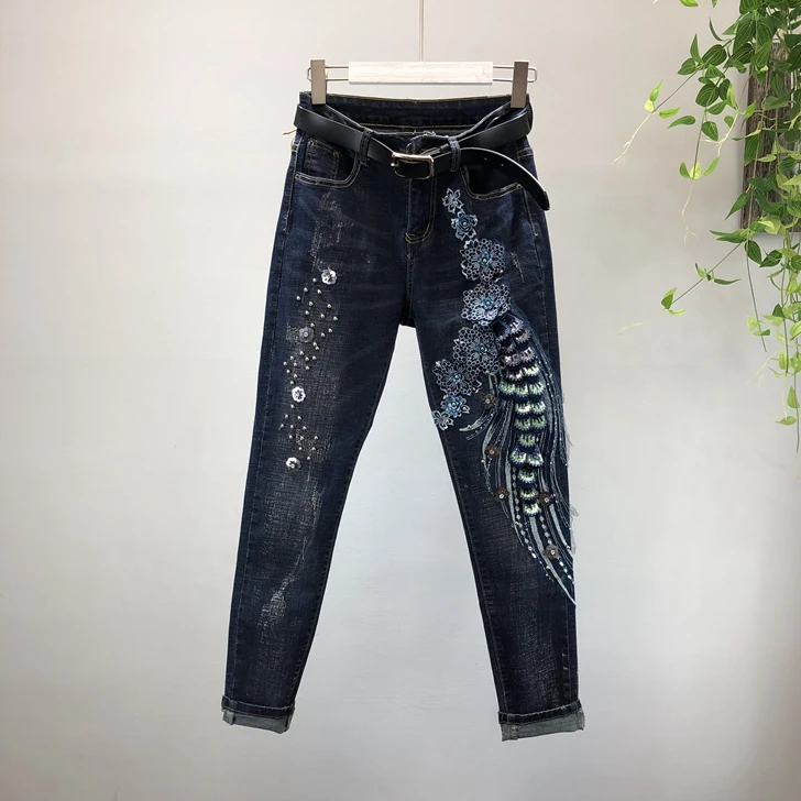 European station heavy industry nail beads holes elastic jeans slim pencil jeans women 
European station heavy industry nail beads holes elastic jeans slim pencil jeans women