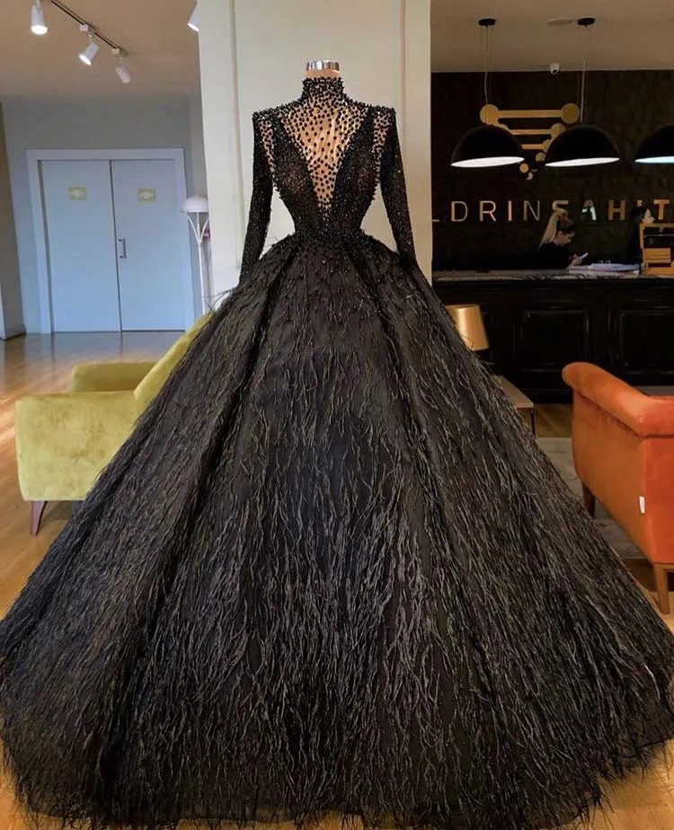 Elegant Moda Vestidos De Fieesta Black High Collar Beaded Long Sleeve Ball Gown Floor Length Feather Evening Dresses
Elegant Moda Vestidos De Fieesta Black High Collar Beaded Long Sleeve Ball Gown Floor Length Feather Evening Dresses