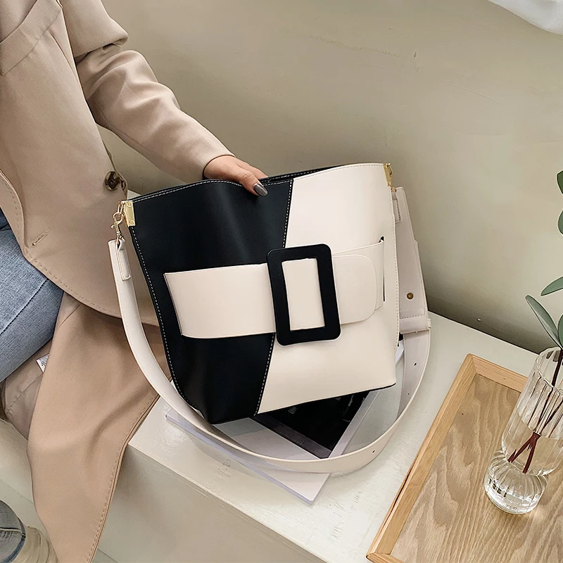 Large Leather Shoulder Bucket Bag for Women 2020 New Trend Contrast Color Handbags Female Wide Shoulder Strap Crossbody Bag Sac
Large Leather Shoulder Bucket Bag for Women 2020 New Trend Contrast Color Handbags Female Wide Shoulder Strap Crossbody Bag Sac