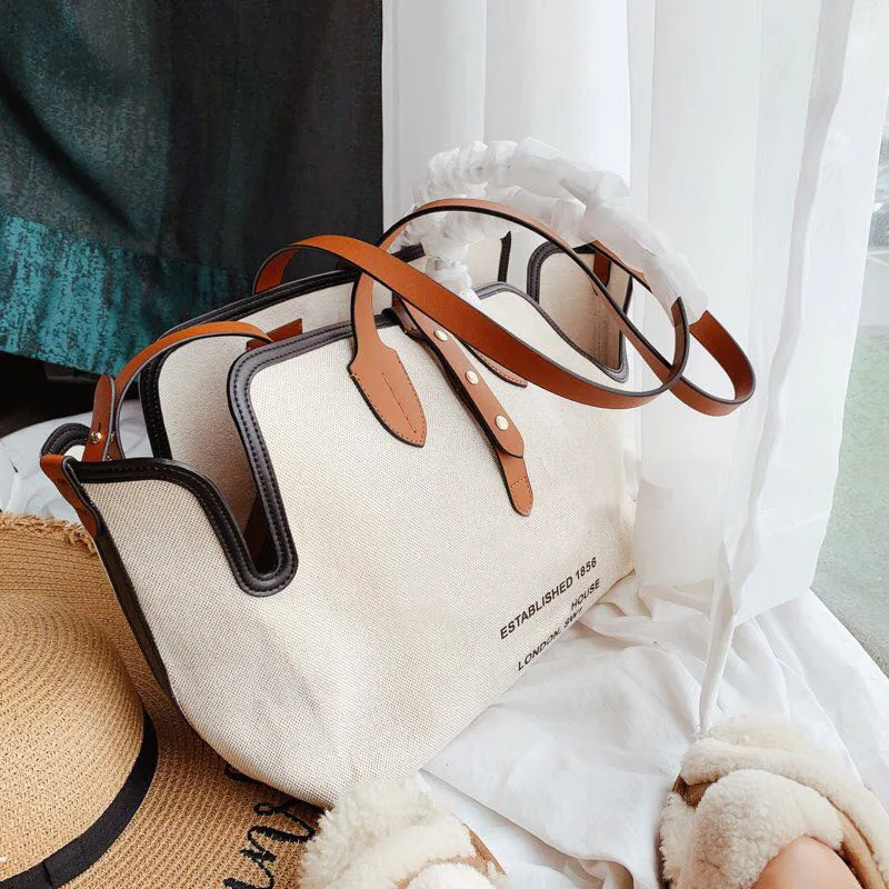High End Women Canvas Tote Bag 35*28 CM Large Capacity Shopping Bag with Shoulder Straps Letters Printed Cross Body Bags
High End Women Canvas Tote Bag 35*28 CM Large Capacity Shopping Bag with Shoulder Straps Letters Printed Cross Body Bags