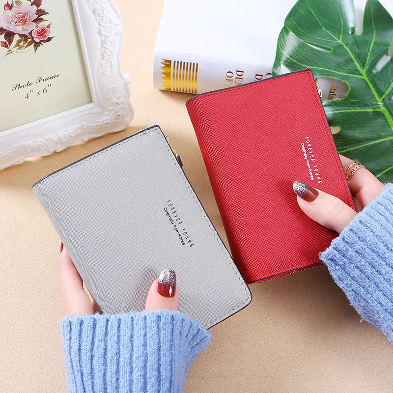 Hand wallet female 2020 new short zipper Korean fashion small fresh card holder multi-function large capacity student girl
Hand wallet female 2020 new short zipper Korean fashion small fresh card holder multi-function large capacity student girl