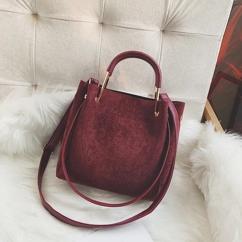 Korean version of sanded three-dimensional bucket bag simple fashion magnetic button single shoulder oblique span women's bag
Korean version of sanded three-dimensional bucket bag simple fashion magnetic button single shoulder oblique span women's bag