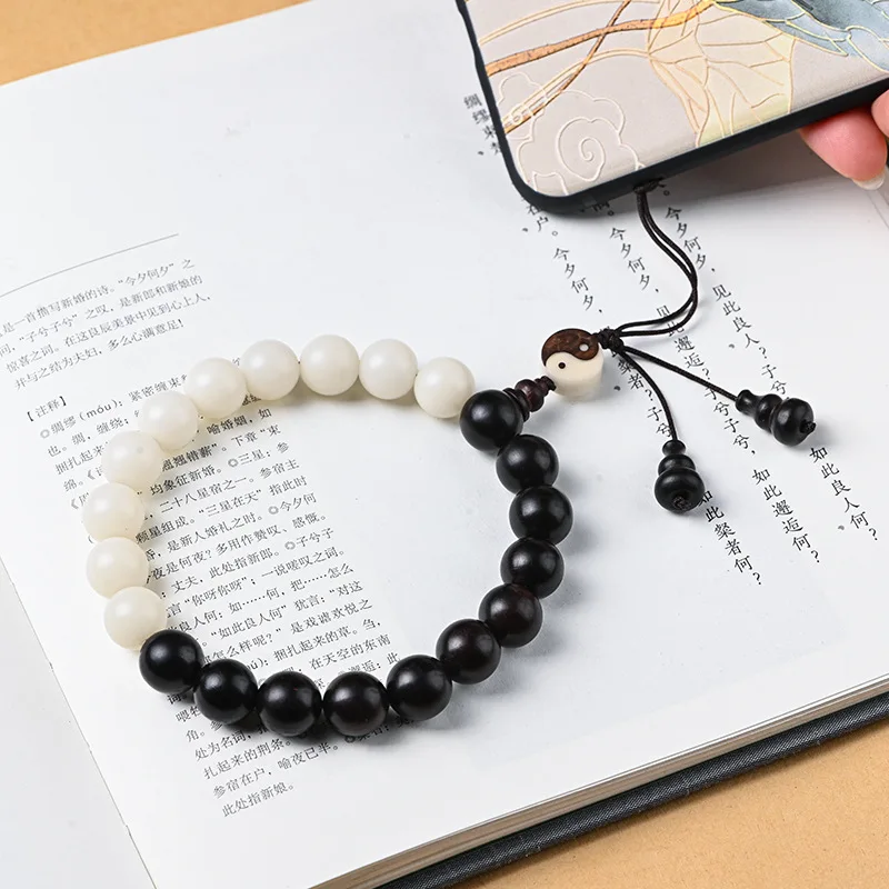 

White Bodhi Root Ebony Taoist Tai Chi Bagua Mixed Yuanzhu mobile phone chain personality Yin Yang fish mobile phone lanyard