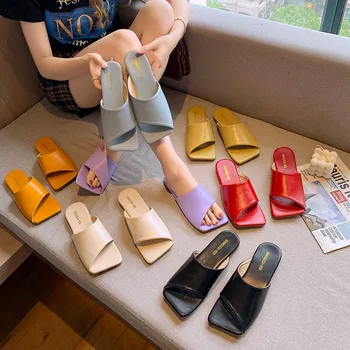 Summer wear fashion flat bottom word drag 2020 Korean version of the new jelly color holiday beach slippers female 
Summer wear fashion flat bottom word drag 2020 Korean version of the new jelly color holiday beach slippers female