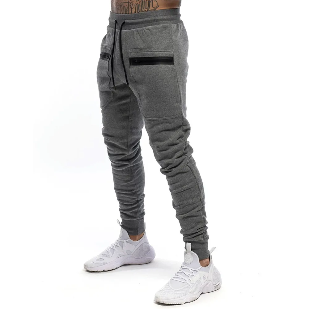 Autumn New Trackpants Casual Pants Jogger Sweatpants Men Cotton Skinny Trousers Male Gyms Fitness Workout Sportswear Pencil pant
Autumn New Trackpants Casual Pants Jogger Sweatpants Men Cotton Skinny Trousers Male Gyms Fitness Workout Sportswear Pencil pant