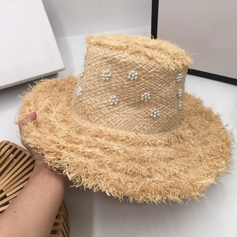 Europe and the United States handmade pearl straw hat new flash lafite topi beach resort is prevented bask in tidal basin female
Europe and the United States handmade pearl straw hat new flash lafite topi beach resort is prevented bask in tidal basin female