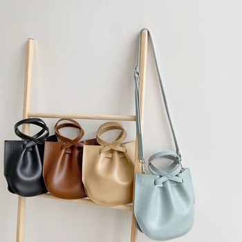 2020 New Women Top Handle Bags PU leather Designer Small Female Handbag Ladies Shoulder Bag Solid Color Drawstring Crossbody Bag 
2020 New Women Top Handle Bags PU leather Designer Small Female Handbag Ladies Shoulder Bag Solid Color Drawstring Crossbody Bag