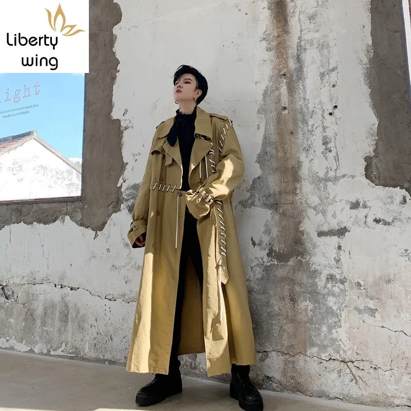 Qualities New Designer Drawstring Mens Patchwork Overcoats Harajuku Sleeve Lapel Belt Loose Big Size Male Long Trench Coats
Qualities New Designer Drawstring Mens Patchwork Overcoats Harajuku Sleeve Lapel Belt Loose Big Size Male Long Trench Coats
