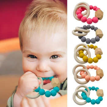 Baby Nursing Chew Bracelets Toddler Teether Wood Rattles Toys Gift for Baby Wooden Teethers Teething Grasping Toy
Baby Nursing Chew Bracelets Toddler Teether Wood Rattles Toys Gift for Baby Wooden Teethers Teething Grasping Toy
