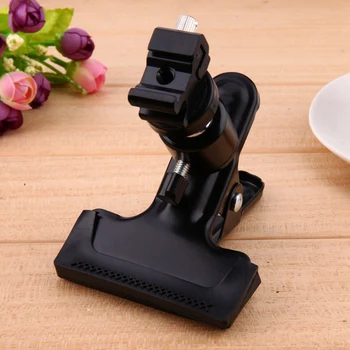 Professional Metal Photo Studio Backdrop Clamp Ball Head Hot Shoe Adapter Flash Light Stand Bracket W 1/4 Standard Thread
Professional Metal Photo Studio Backdrop Clamp Ball Head Hot Shoe Adapter Flash Light Stand Bracket W 1/4 Standard Thread