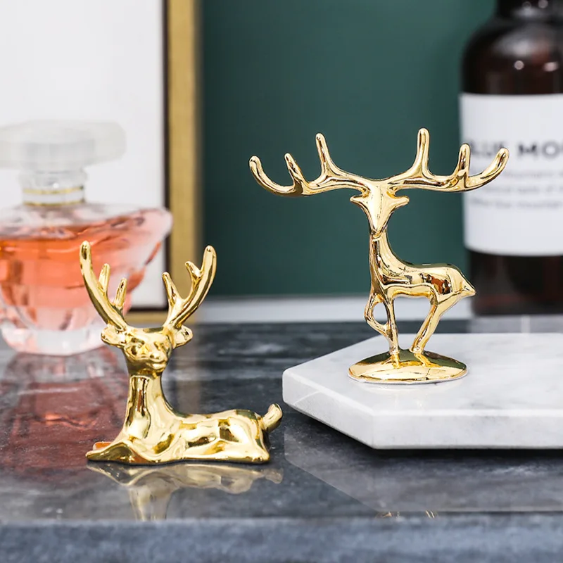 Mini Light Metal Golden Couple Deer Figurines Nordic Animal Ring Jewelry Holder Artcraft Gifts for the New Year Home Decoration
Mini Light Metal Golden Couple Deer Figurines Nordic Animal Ring Jewelry Holder Artcraft Gifts for the New Year Home Decoration