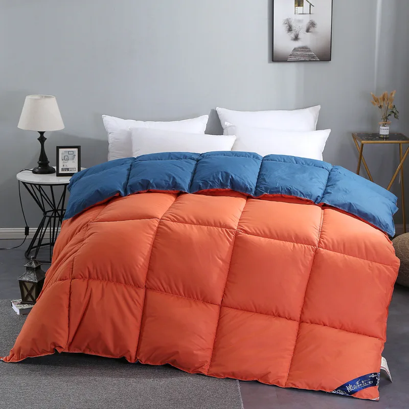 All-cotton down quilt in spring and autumn is thickened to keep warm in winter by student dormitory core down quilt 
All-cotton down quilt in spring and autumn is thickened to keep warm in winter by student dormitory core down quilt