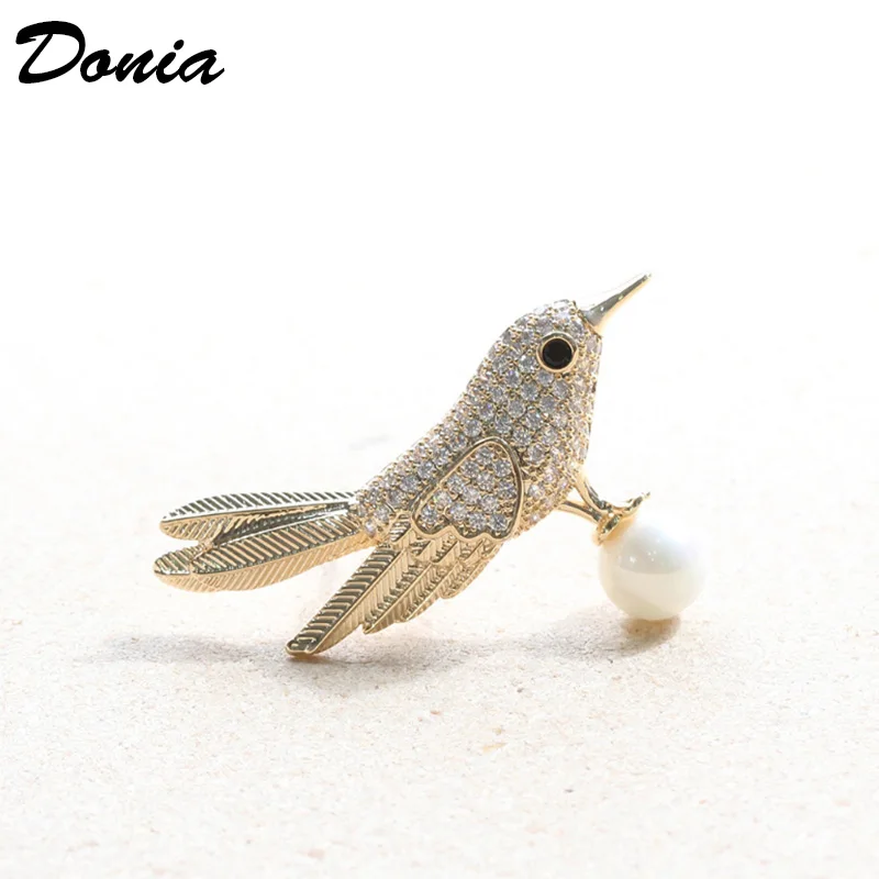 Donia jewelry Gold micro-inlaid AAA zircon bird brooch cute animal small pin men and women models Korean shell pearl brooch
Donia jewelry Gold micro-inlaid AAA zircon bird brooch cute animal small pin men and women models Korean shell pearl brooch