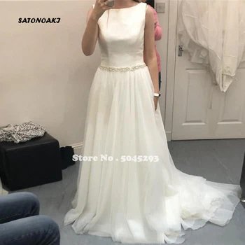 Simple Boho Wedding Dress 2020 Scoop Neck Beaded Sash Summer Beach Bridal Gowns Sweep Train Vestidos Robe De Mariage Undefined
Simple Boho Wedding Dress 2020 Scoop Neck Beaded Sash Summer Beach Bridal Gowns Sweep Train Vestidos Robe De Mariage Undefined