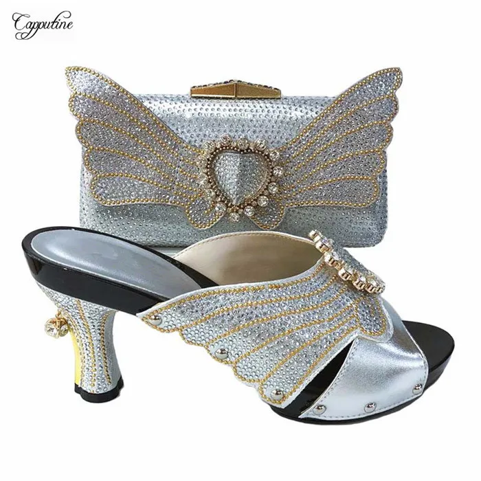 New coming silver African slip on sandal shoes and bag set for party 1165-2, heel height 9cm
New coming silver African slip on sandal shoes and bag set for party 1165-2, heel height 9cm
