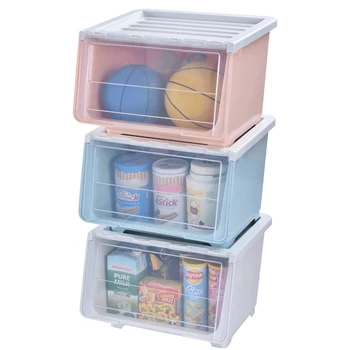Three large toy storage boxes with snacks in baskets and open storage boxes in front of overturned tidy boxes
Three large toy storage boxes with snacks in baskets and open storage boxes in front of overturned tidy boxes