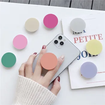 Universal fresh solid color cute round foldable mobile phone handle bracket mobile phone ring bracket suitable for iPhone
Universal fresh solid color cute round foldable mobile phone handle bracket mobile phone ring bracket suitable for iPhone