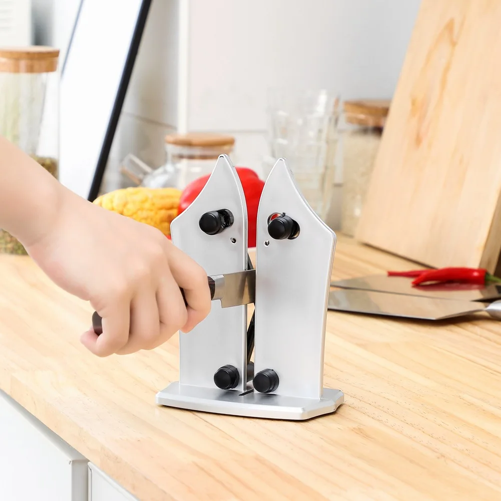 Kitchenware V-shaped knife sharpener Household hand-held knife sharpener with base Multifunctional knife sharpener
Kitchenware V-shaped knife sharpener Household hand-held knife sharpener with base Multifunctional knife sharpener
