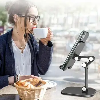 Dual-axis foldable desktop lazy mobile phone suitable for ipad computer adjustable mobile phone holder
Dual-axis foldable desktop lazy mobile phone suitable for ipad computer adjustable mobile phone holder