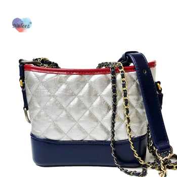 Nuleez bag women vagrant bag diamond lattice genuine leather fashion double color chain bag coss-body bucket bag
Nuleez bag women vagrant bag diamond lattice genuine leather fashion double color chain bag coss-body bucket bag