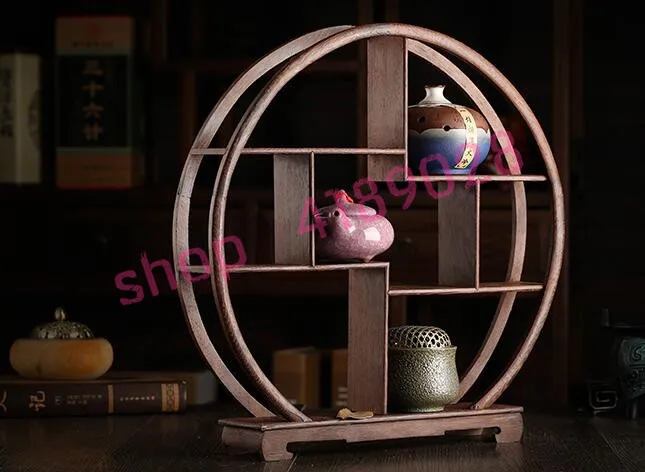 Solid wood chicken wing wood, round (large size) curio shelves, ornament pendulum rack.
Solid wood chicken wing wood, round (large size) curio shelves, ornament pendulum rack.
