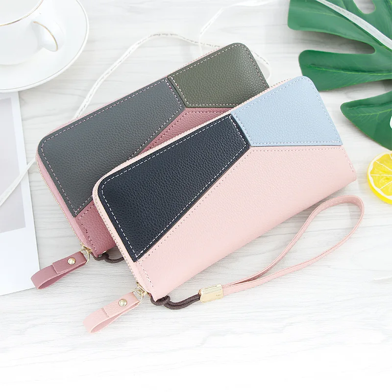 The new 2019 ms han edition wallet long hand stitching ms candy color girl's cell phone bag zipper bag
The new 2019 ms han edition wallet long hand stitching ms candy color girl's cell phone bag zipper bag