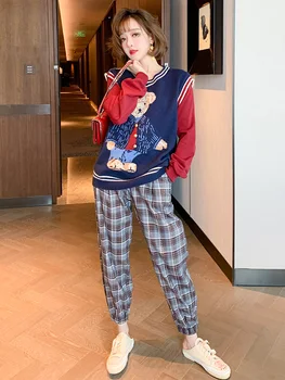 Fake two-piece splicing sleeves V-neck knitted top + plaid trousers suit women 2020 autumn new 
Fake two-piece splicing sleeves V-neck knitted top + plaid trousers suit women 2020 autumn new