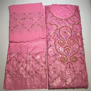 pink bazin riche getzner with beads and stones luxury design beaded african bazin riche getzner for wedding
pink bazin riche getzner with beads and stones luxury design beaded african bazin riche getzner for wedding