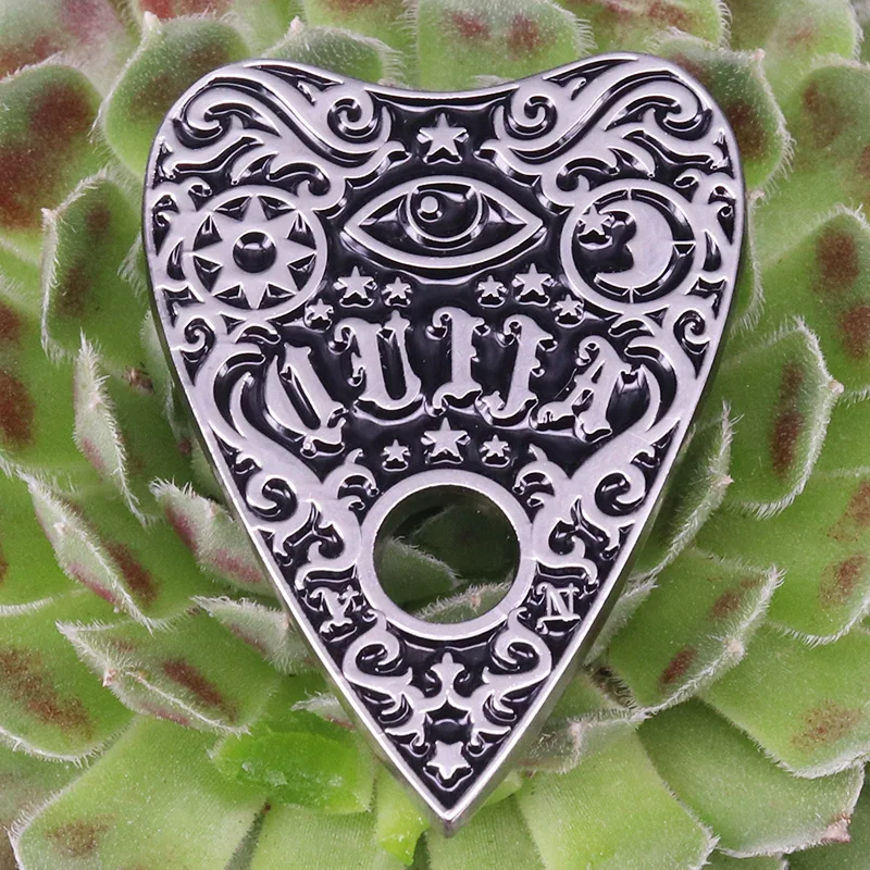 Ouija Pin Gothic Goth Witch Spiritualism Occultism Ghost Planchette oddities Halloween Creepy Horror Gift Enamel pin
Ouija Pin Gothic Goth Witch Spiritualism Occultism Ghost Planchette oddities Halloween Creepy Horror Gift Enamel pin