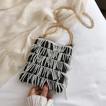 tote Crossbody Bags For Women 2020 High Quality PU Leather Luxury Handbags Designer Ladies Pearl Tassel Shoulder Messenger Bag
tote Crossbody Bags For Women 2020 High Quality PU Leather Luxury Handbags Designer Ladies Pearl Tassel Shoulder Messenger Bag