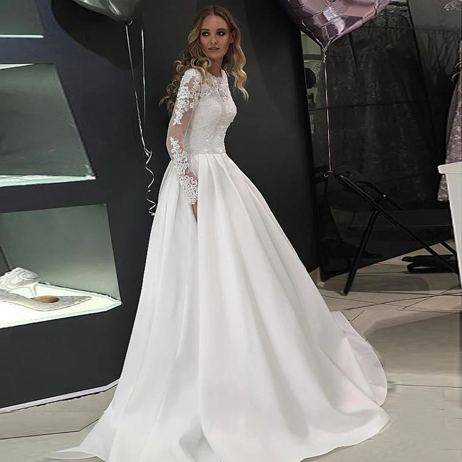 

Splendid Tulle High Neckline A-line Wedding Dresses Long Sleeves Crystals Bridal Dress Button Down Wedding Gowns